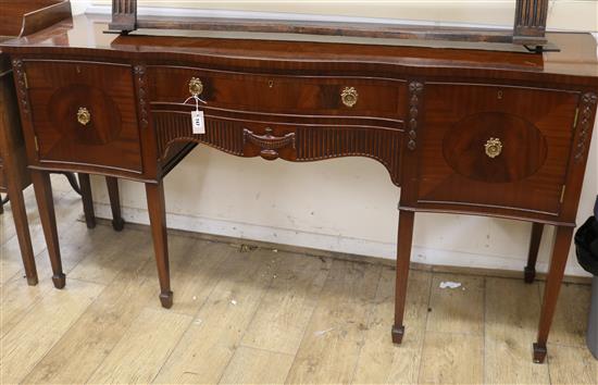 A George III style mahogany serpentine fronted sideboard W.182cm